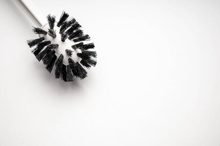 a toilet brush on a white background. close-up. cleanliness and hygiene.