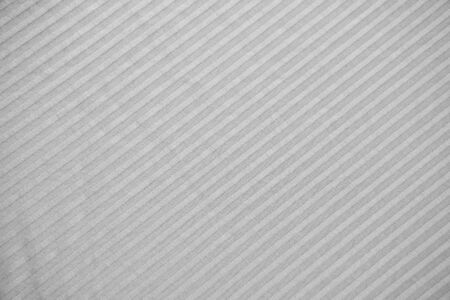 grey striped fabric. the lines are parallel. pattern and background.の写真素材