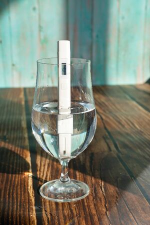 close up. TDS meter to determine the quality of drinking water. purification and filtering...
