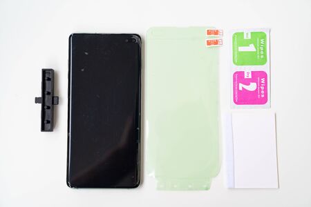 Glass screen protector or glass cover. transparent tempered glass shield for mobile phone. black...
