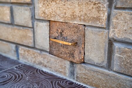 ash-pit hatch. aboveground large brick tandir oven in the garden in a country houseの写真素材