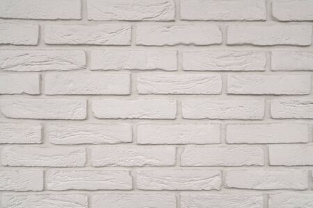 wall of white brick. stone background. the decorative finish.の写真素材
