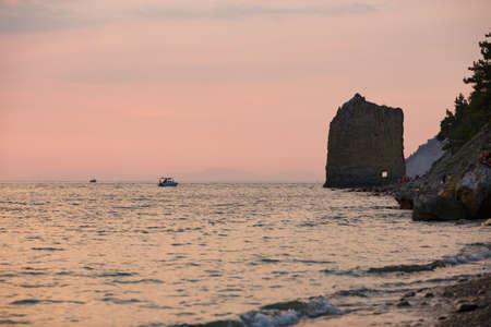 5.09.2016 Russia Sail Rock. Sunset on a wild beach on the Black sea. the mountains and the coast....