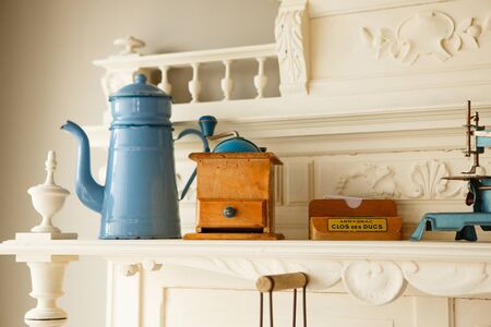 old coffee pot and coffee grinder, sewing machine and a box that says, in French. vintage elements for decoration in the style of Provence.の写真素材