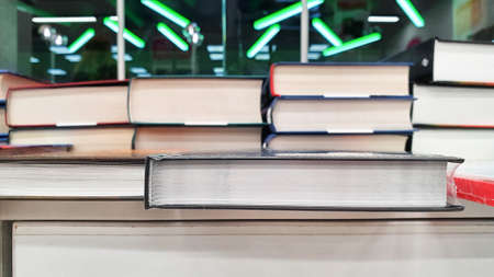 textbooks, books on a shelf in a store or library. love of reading. children's and adult literature.の写真素材