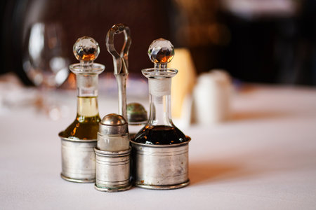 a set of containers for spices, sauces and oil on a retro-style stand