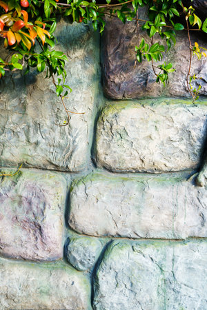 wall of stone bricks. background and texture of cobblestones.の写真素材