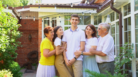 three generations of same family. photo shoot in backyard of country house