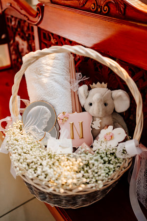 basket with a set for the baptism of a little girl.