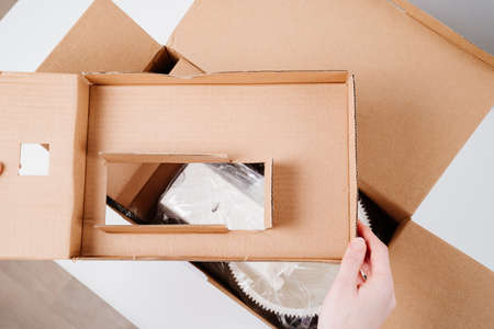 White Kitchen Mixer with bowl is taken out of box. delivery of goods from store