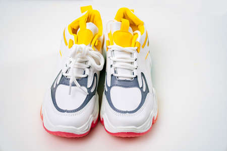 new multi-colored sneakers on a white background.