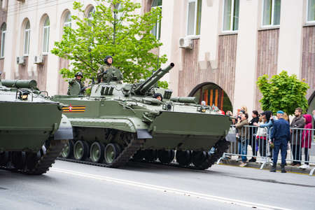BMP-3. Military equipment drives through the streets of the city.のeditorial素材