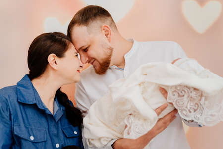 happy family with a baby in their arms. discharge from the hospital.の写真素材
