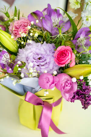 a colorful bouquet of flowers. a bright gift for a woman for a birthday.の写真素材