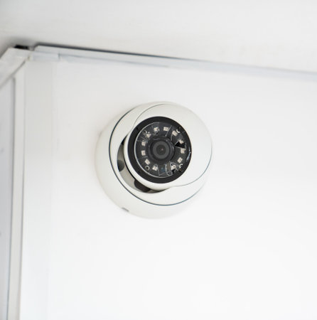 A CCTV camera with broken glass. vandalism.の写真素材