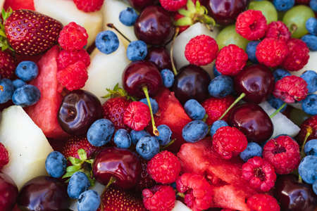 assorted fruits and berries - summer harvest. delicious dessert