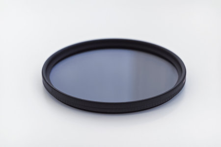 cpl polarization filter for photo video cameras on white background