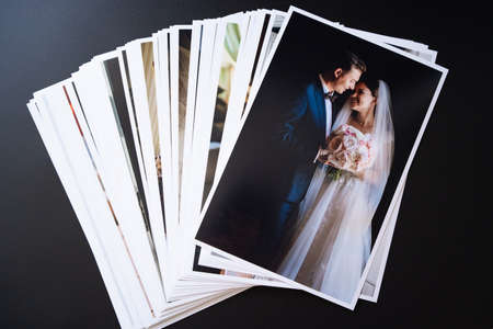 stack of wedding photos. the result of the photographers work at the wedding.の写真素材