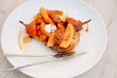 original serving of hot vegetable salad cooked on the grill. Catering.