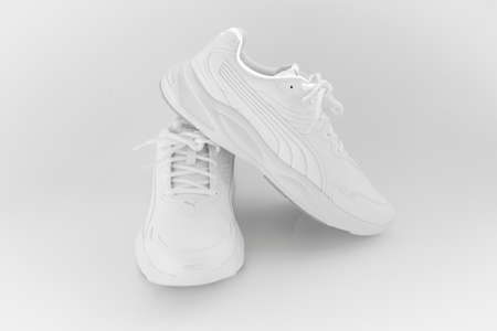 white sneakers with laces on a white background. isolate. pumaのeditorial素材