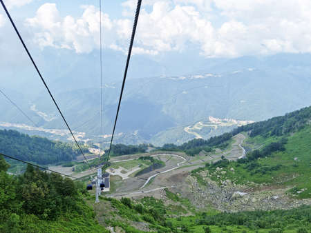 cable car in the mountains. summer tourism.の写真素材