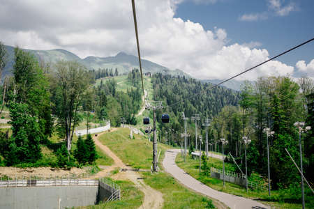 cable car in the mountains. summer tourism.の写真素材