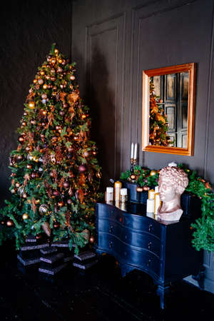 big beautiful elegant Christmas tree in the loft interior.の写真素材