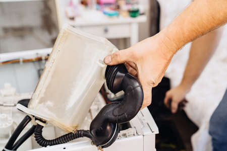 repair of household appliances at home with their own handsの写真素材