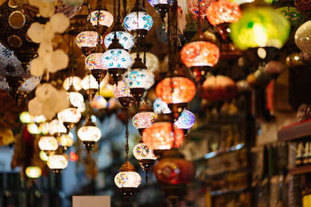 Mosaic Turkish lanterns in the evening in a souvenir shop.の写真素材