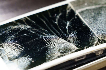 Battery swelling: damage to the back cover of the phone, the displayの写真素材