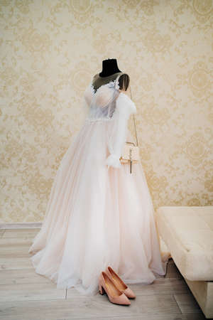 original brand bag Yves Saint Laurent on the wedding dress.のeditorial素材