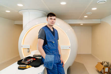 installer engineer of mri apparatus with tools near scannerの写真素材