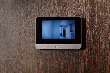 video screen of the peephole or intercom on the front door.