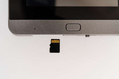 Part of video screen of the peephole with usb flash drive on a white background
