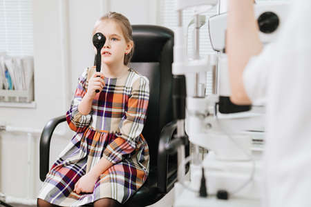 vision diagnostics a little girls. clinic of treatment and correction of visionの写真素材