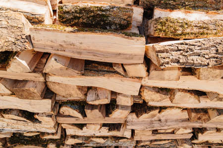 Logs. stacked firewood for kindling a fireplace or barbecue.