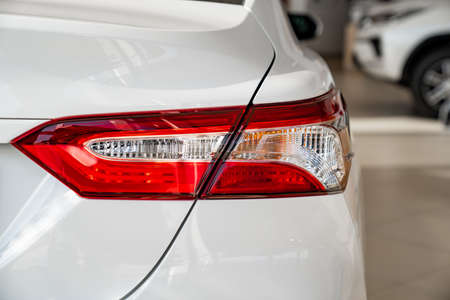 tail light on the new white Toyota camry. purchase and sale of new cars in salon