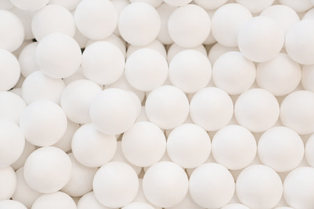 lots of white plastic balls for dry pool.の写真素材