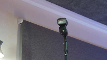 Professional flash for photographing in a dark room.