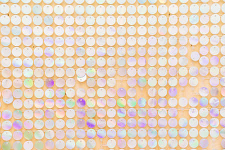 a wall with shiny sequins. glitter and shimmer.の写真素材