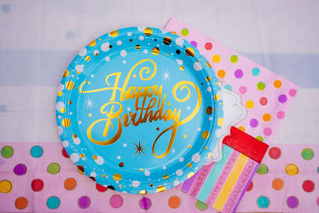 disposable tableware, tablecloth and napkins for a childrens holiday.の写真素材