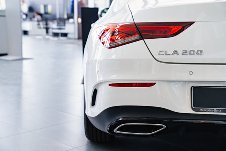 tail light of a white Mercedes CLA 200 car in the parking of a car dealershipのeditorial素材