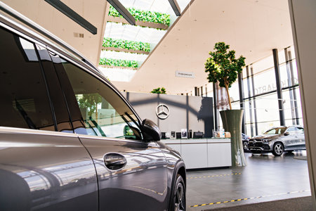 cars and interior of the Mercedes car dealership. sale of new cars on credit.のeditorial素材