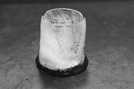 the process of melting an ice cube. black-and-white.の写真素材