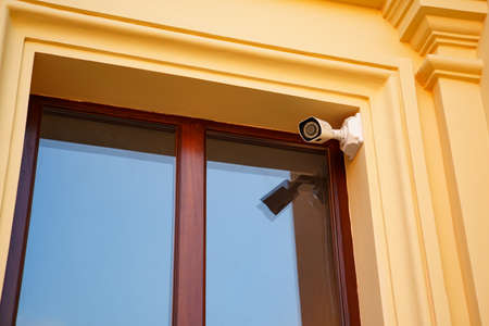 Surveillance camera for the safety and security of the building on the windows.
