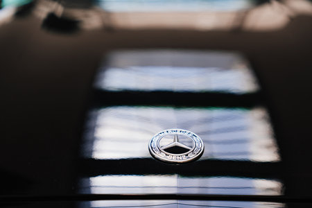The logo of the Mercedes car on the hood.のeditorial素材