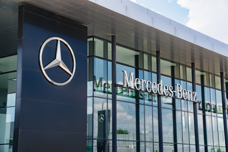 exterior of the Mercedes car dealership. sale of new cars on credit.のeditorial素材