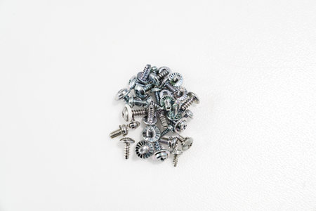 Screws, self-tapping, bolts on a white background.