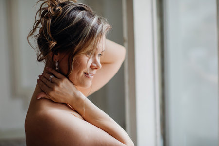 a delicate and sensual portrait of a middle-aged woman.の写真素材