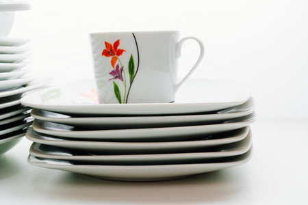 cups and plates with the inscription of the company Bekker Germanyのeditorial素材